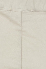 Product shot of the Fuss Free 7/8 Pant in colour Sand, detail