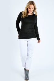 Model Jess wearing size L of the Merino Signature Crew Top in colour Charcoal (Grey), from the front, showing the whole outfit