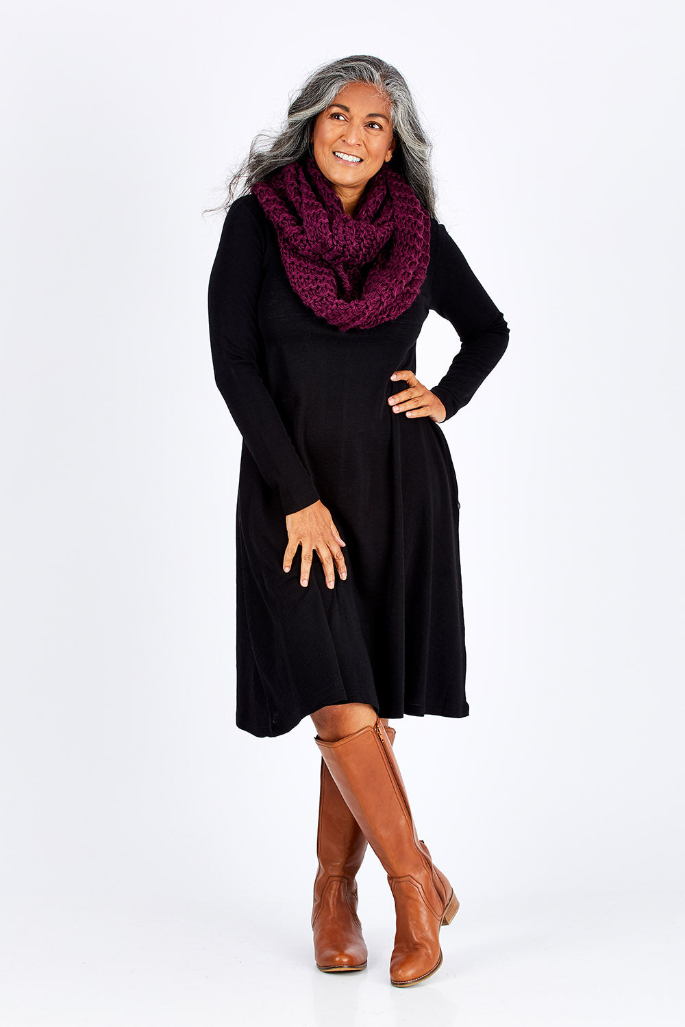 Model Nadine wearing size S of the Raise The Bar Rib Swing Shift in colour Black (Black), from the front, showing the whole outfit