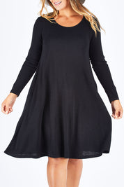 Model Palatina wearing size L of the Raise The Bar Rib Swing Shift in colour Black (Black), from the front, cropped image