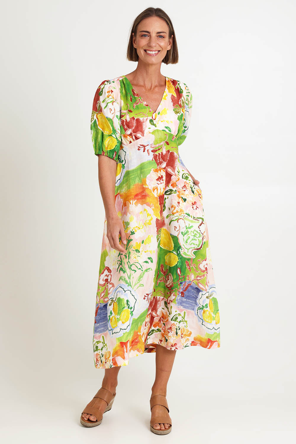 Model Riinar wearing size 10 of the Empire Ly Yours Dress – Enchanted in colour Enchanted, from the front