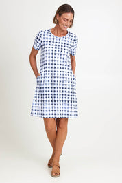 Model Riinar wearing size 10 of the Here Comes Summer Dress – Checkers in colour Checkers, from the front