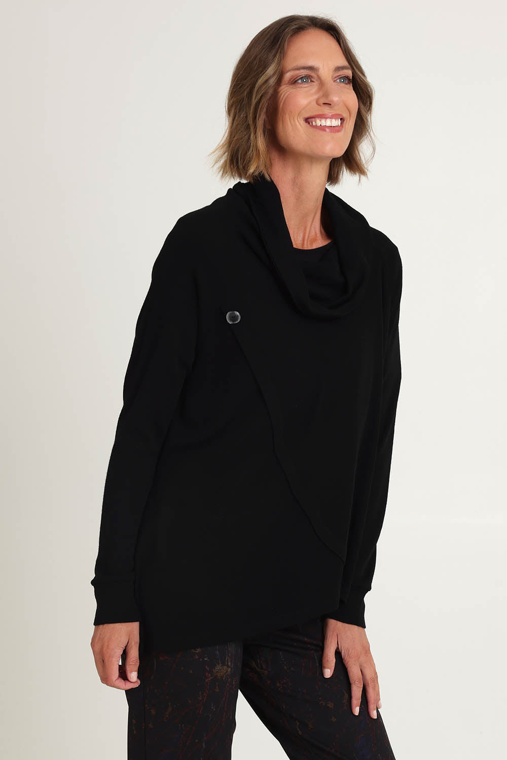 Model Riina wearing size S of the Good Stakes Top in colour Black (Black), from the front, cropped image