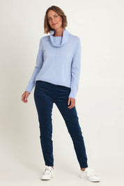 Model Riina wearing size S of the Detail Driven Sweater in colour Articblue (Blue), from the front, showing the whole outfit