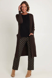 Model Riina wearing size S of the Luxe Line Cardi in colour Cocoa, from the front, showing the whole outfit