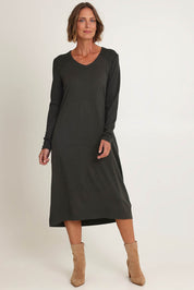 Model Riina wearing size S of the Upper Cut Dress in colour Olive (Green), from the front, showing the whole outfit