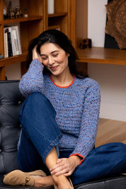 A model wearing the Tip Of Greatness Sweater in colour Blueaura (Blue), from the front, showing the whole outfit