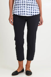Model Riinar wearing size 10 of the Perfect Balance Pant – Black in colour Black, in a cropped view