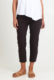 Model Riinar wearing size 10 of the Perfect Balance Pant – Sable in colour Sable, in a cropped view