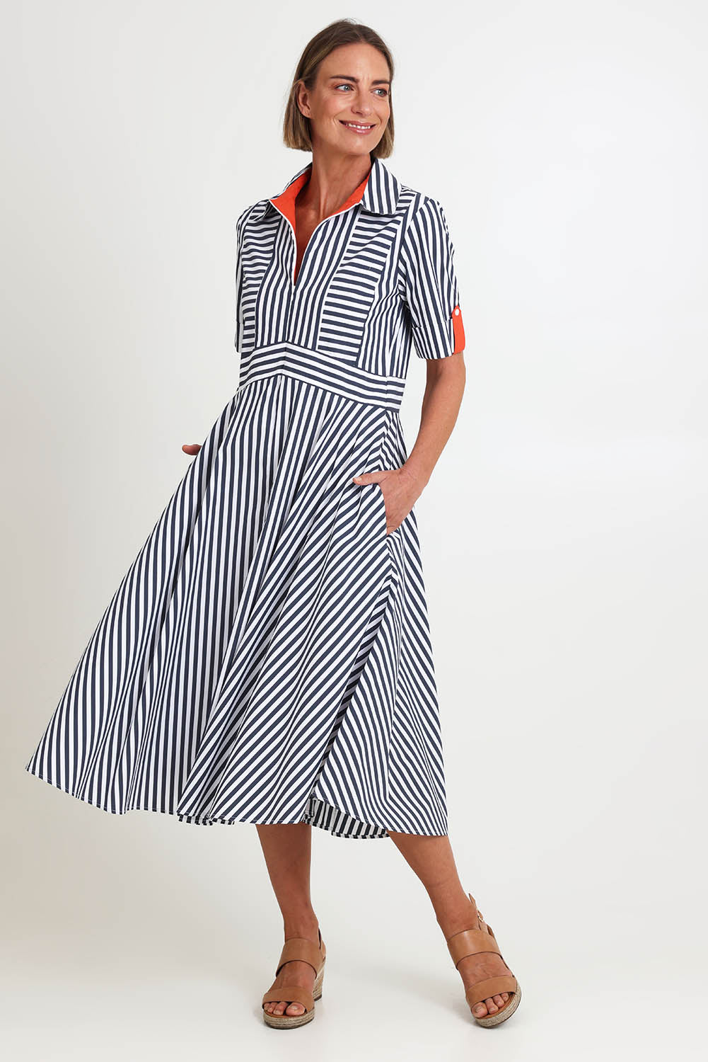 Model Riinar wearing size 10 of the On Point Dress – Navytang in colour Navytang, from the front