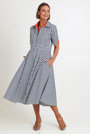 Model Riinar wearing size 10 of the On Point Dress – Navytang in colour Navytang, from the front