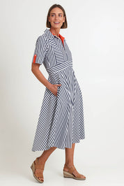Model Riinar wearing size 10 of the On Point Dress – Navytang in colour Navytang, from the front