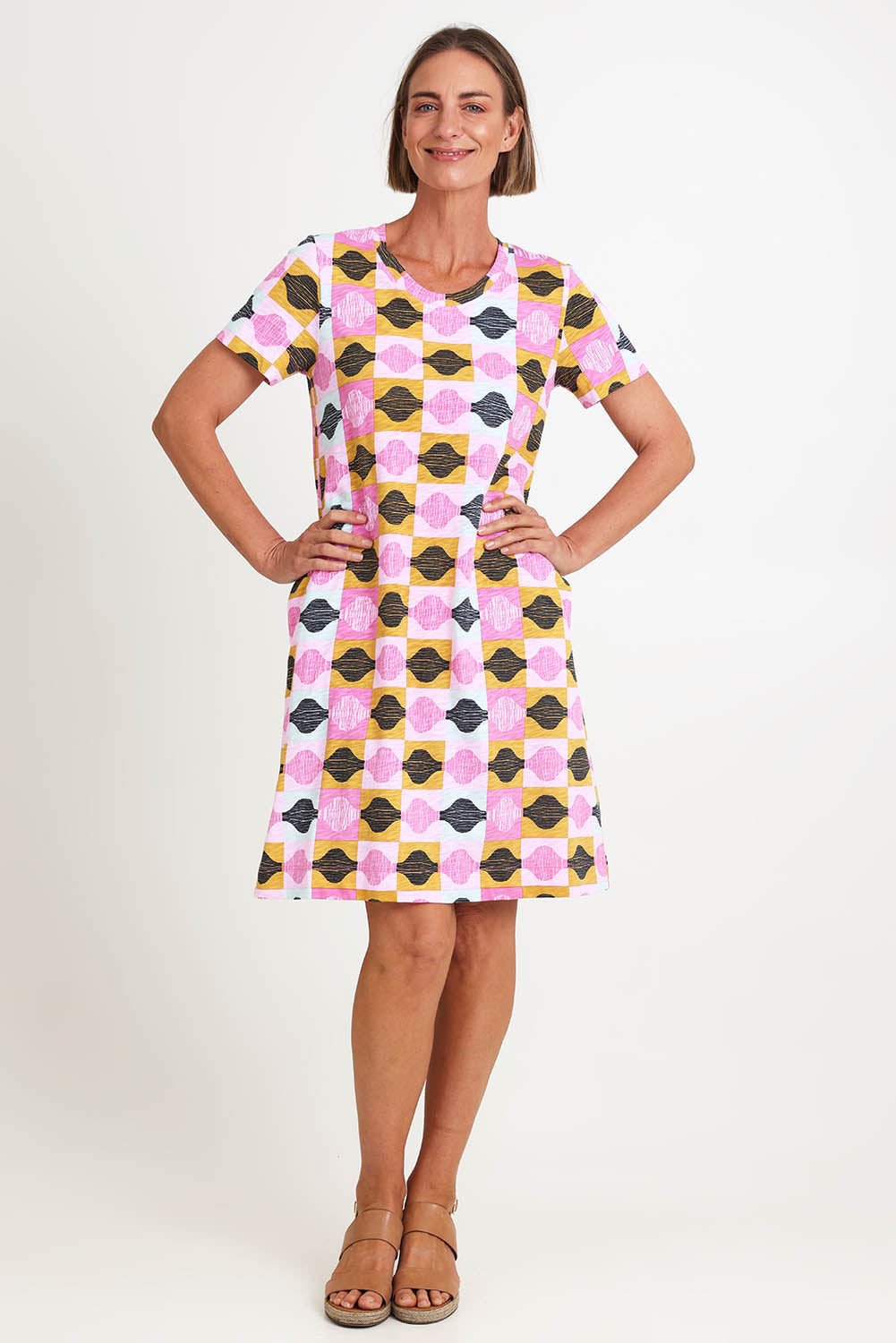 Model Riinar wearing size 10 of the Oh Frock Dress – Rhythm in colour Rhythm, from the front