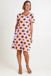 Model Riinar wearing size 10 of the Oh Frock Dress – Rhythm in colour Rhythm, from the front