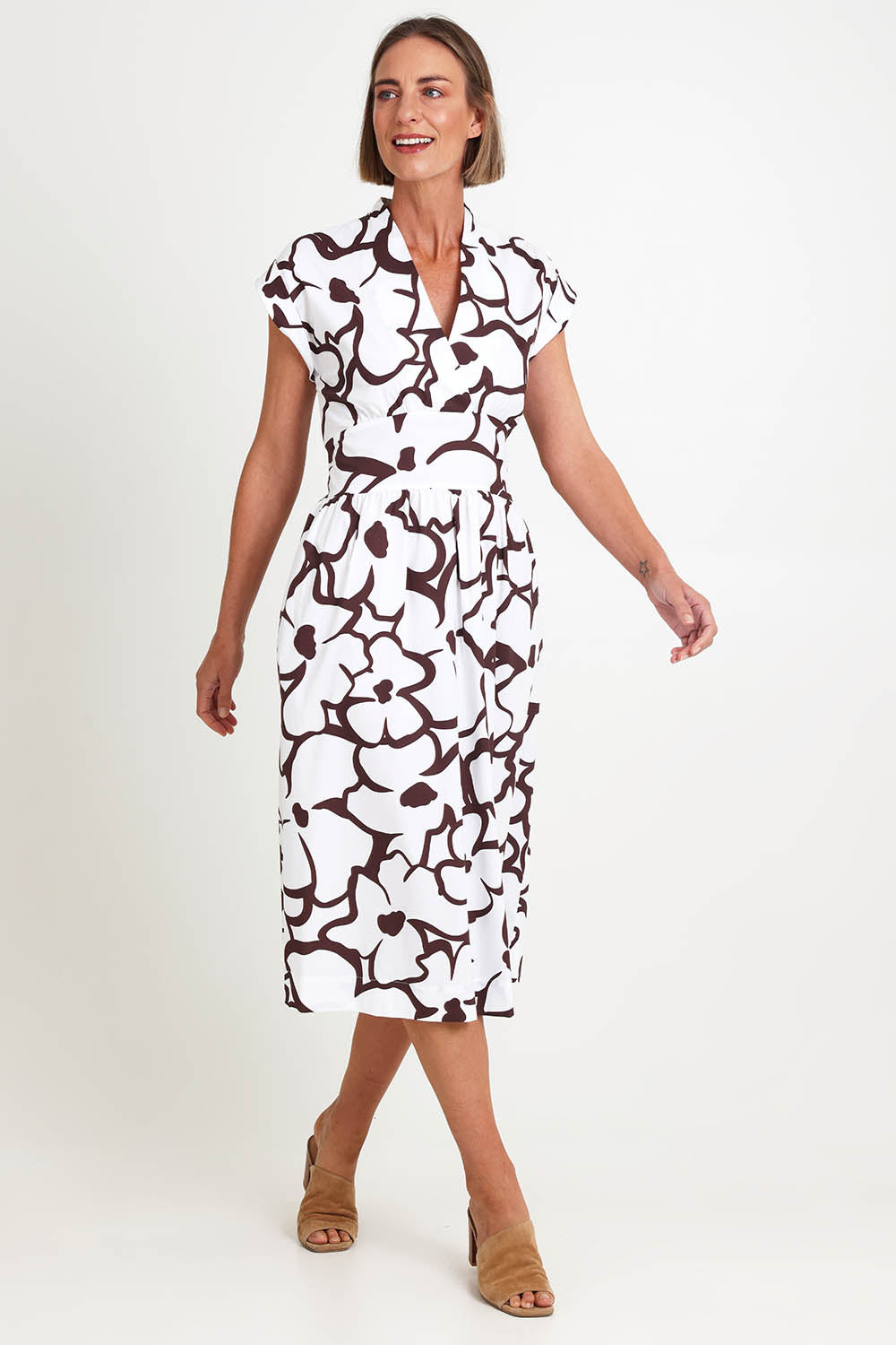 Model Riinar wearing size 10 of the Gifted Dress – Upsadaisy in colour Upsadaisy, from the front