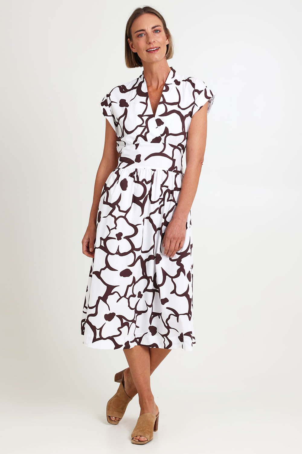 Model Riinar wearing size 10 of the Gifted Dress – Upsadaisy in colour Upsadaisy, from the front