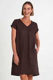 Model Riinar wearing size 10 of the V Festival Dress – Cocoa in colour Cocoa, in a cropped view