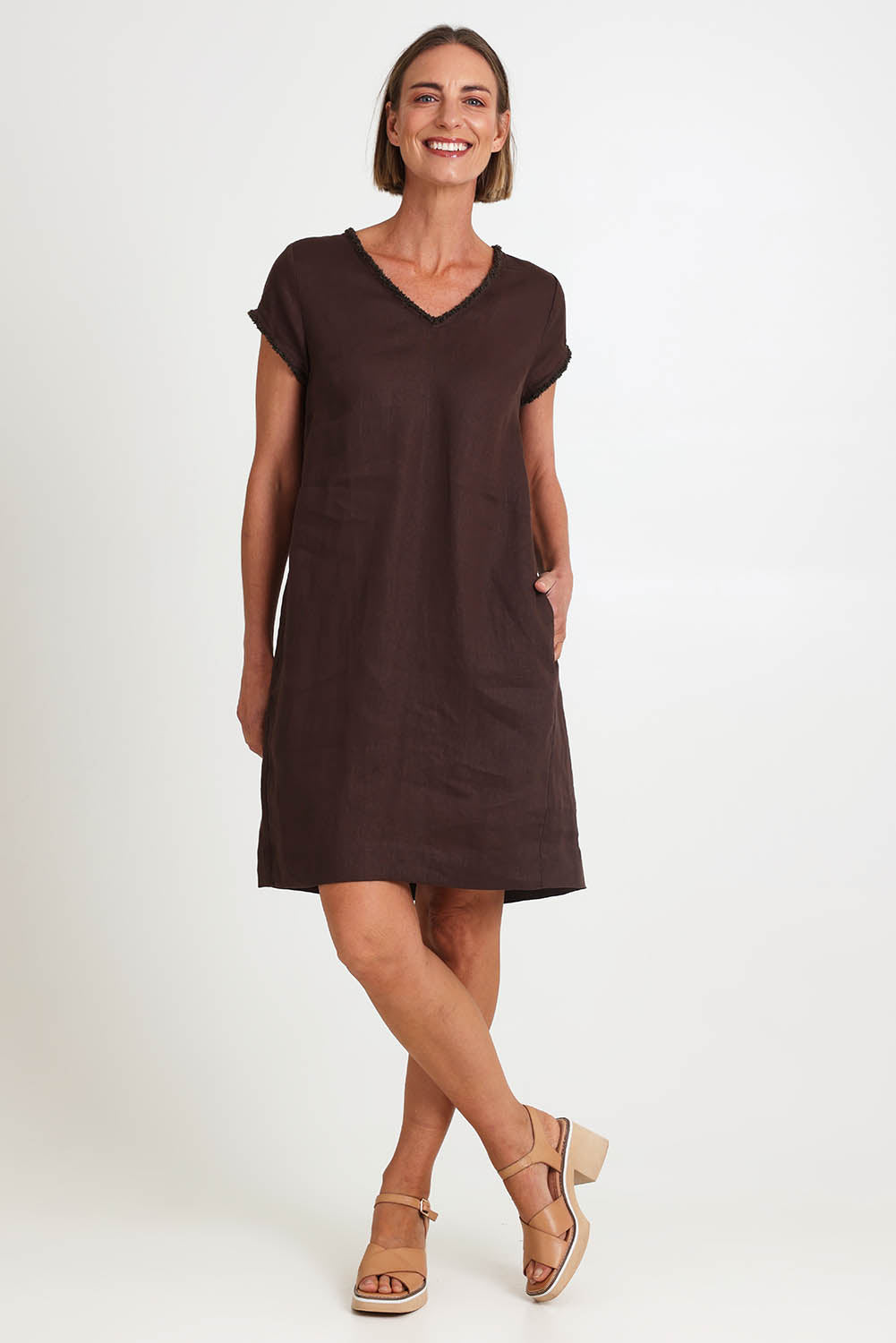 Model Riinar wearing size 10 of the V Festival Dress – Cocoa in colour Cocoa, from the front