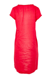 Product shot of the V Festival Dress – Melon in colour Melon, from the back