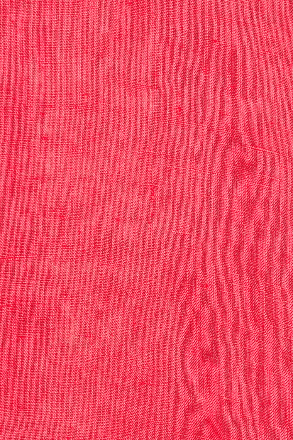 Product shot of the V Festival Dress – Melon in colour Melon, showing detail