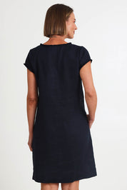 Model Riinar wearing size 10 of the V Festival Dress – Truenavy in colour Truenavy, from an angle