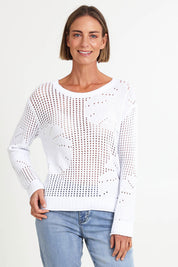 Model Riinar wearing size 10 of the Breeze Easy Sweater – White in colour White, in a cropped view
