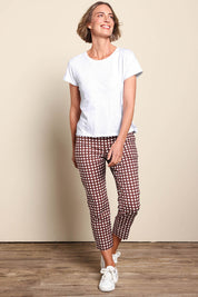 Model Riinar wearing size 10 of the Intersection Tee – White in colour White, from the front