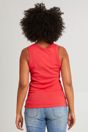 Model Olivia wearing size 10 of the Esme Cotton Tank in colour Cayenne (Red), from the back