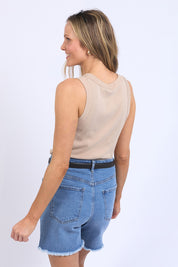 A model wearing the Esme Cotton Tank in colour Oatmeal, from the back