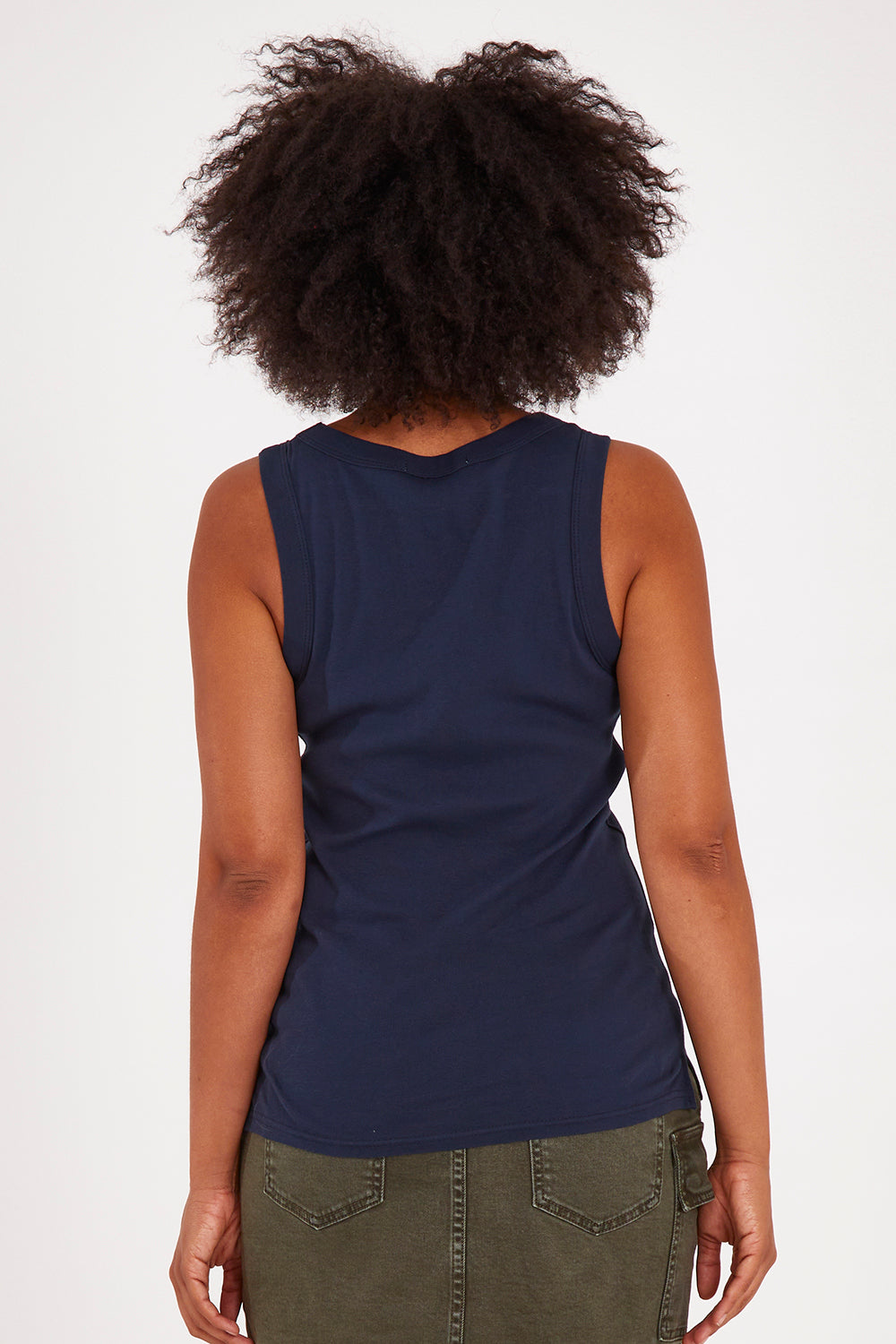 Model Olivia wearing size 10 of the Esme Cotton Tank in colour Sapphire (Blue), from the back