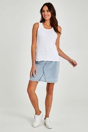 Model Madeline wearing size 10 of the Esme Cotton Tank in colour White (White), from the front, showing the whole outfit