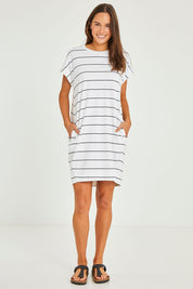 Model Elhana wearing size 10 of the Sunset Cove Stripe Dress in colour Whitenavy (White), from the front, showing the whole outfit