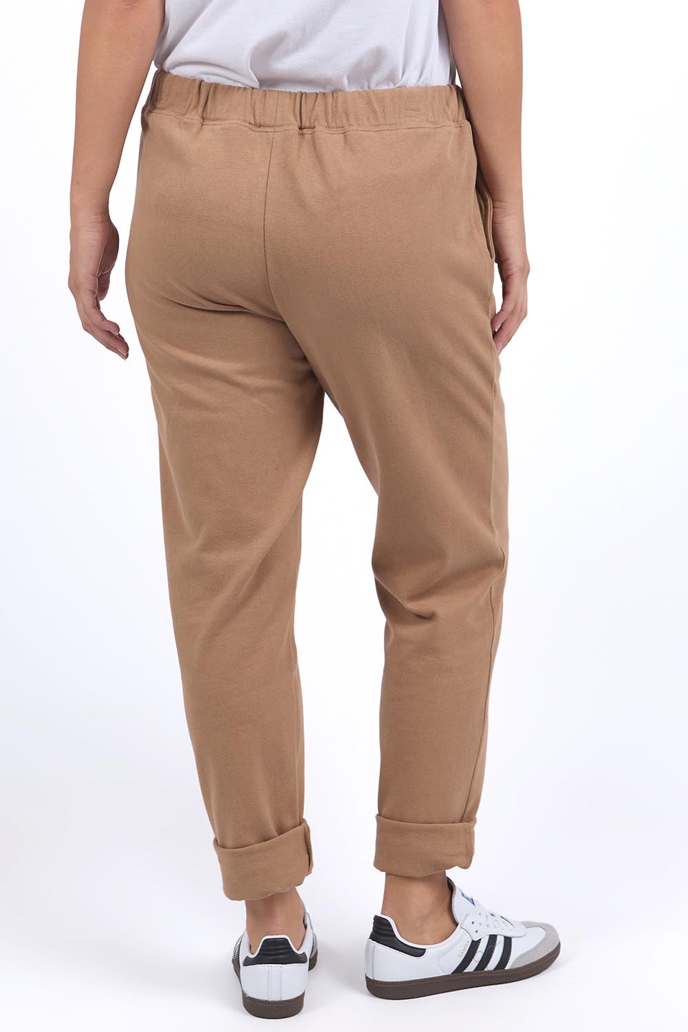 A model wearing the Elements Monday Cotton Pant in colour Coconut, from the back