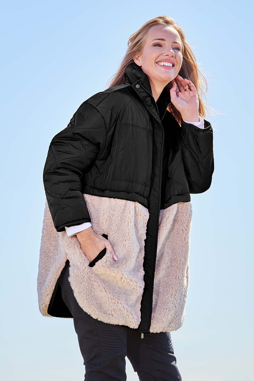 Model Katie wearing size S of the Celia Coat in colour Black (Black), from the front, showing the whole outfit