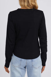 A model wearing the Elements Scoop Rib Cotton Blend  Long Sleeve in colour Black (Black), from the back