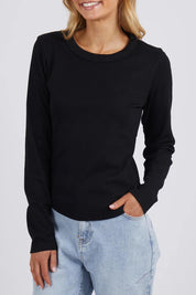 A model wearing the Elements Scoop Rib Cotton Blend  Long Sleeve in colour Black (Black), from the front, cropped image
