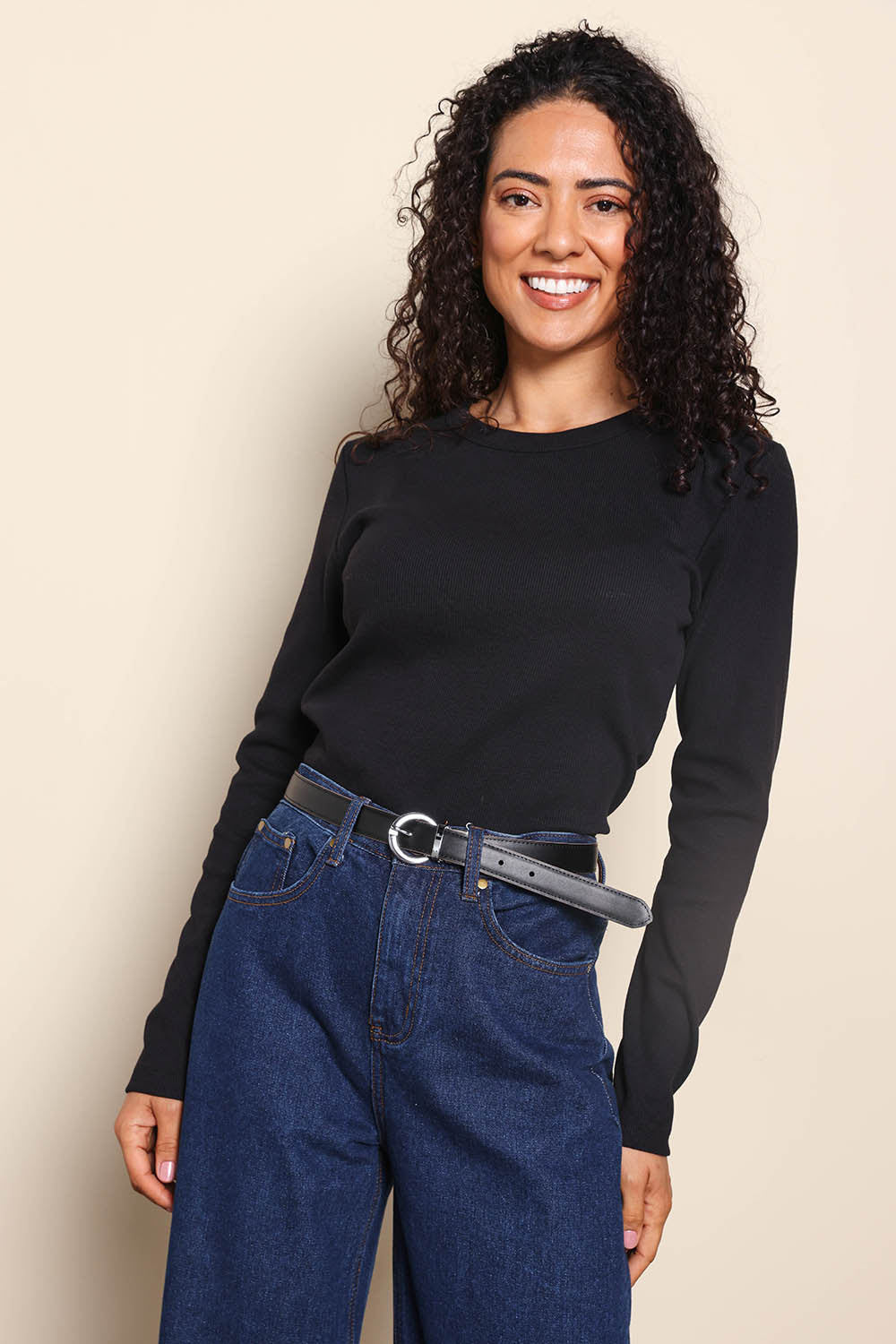 Model Pamelar wearing size 10 of the Elements Scoop Rib Cotton Blend  Long Sleeve - Black in colour Black, in a cropped view