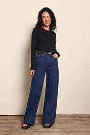 Model Pamelar wearing size 10 of the Elements Scoop Rib Cotton Blend  Long Sleeve - Black in colour Black, from the front