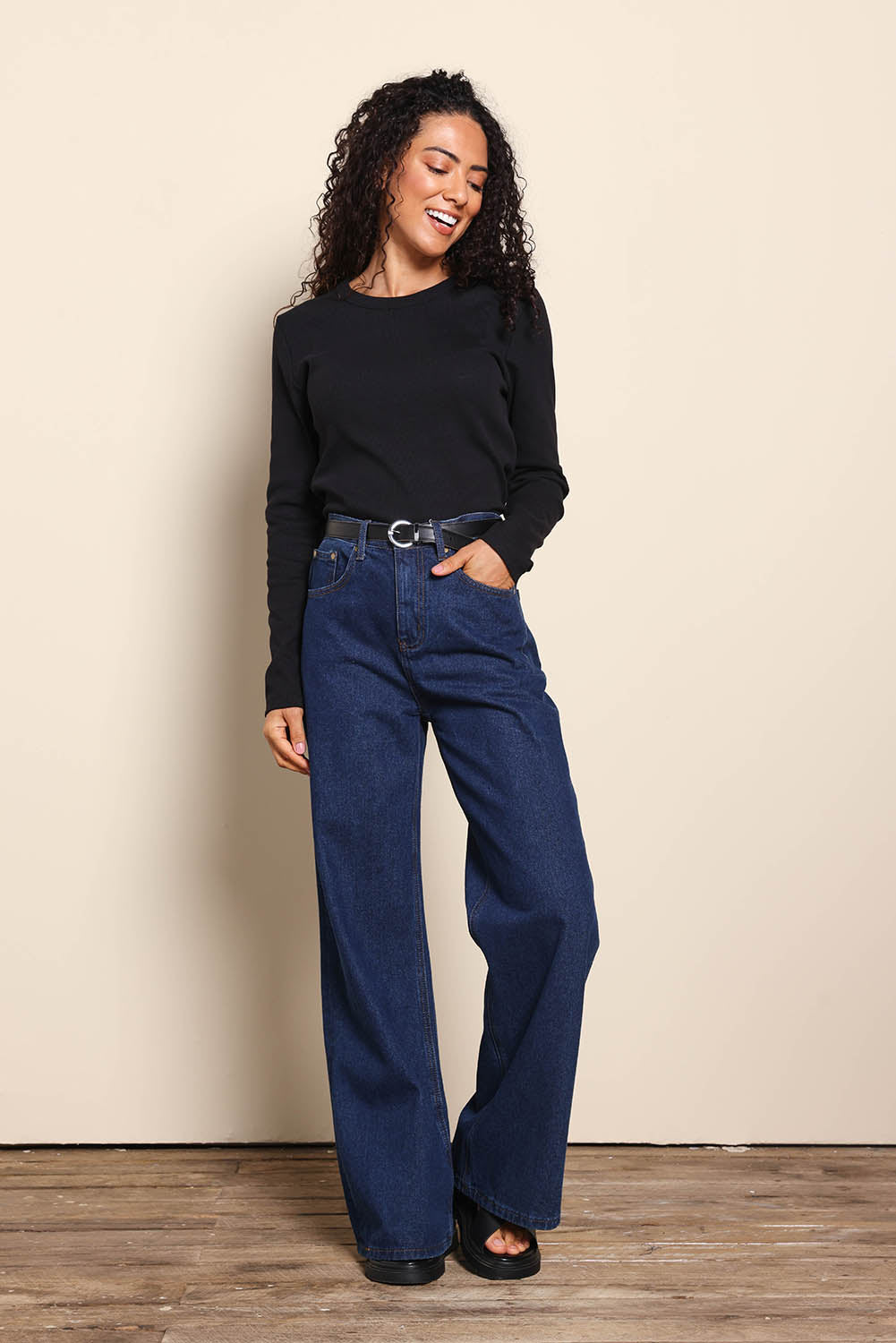 Model Pamelar wearing size 10 of the Elements Scoop Rib Cotton Blend  Long Sleeve - Black in colour Black, from the front