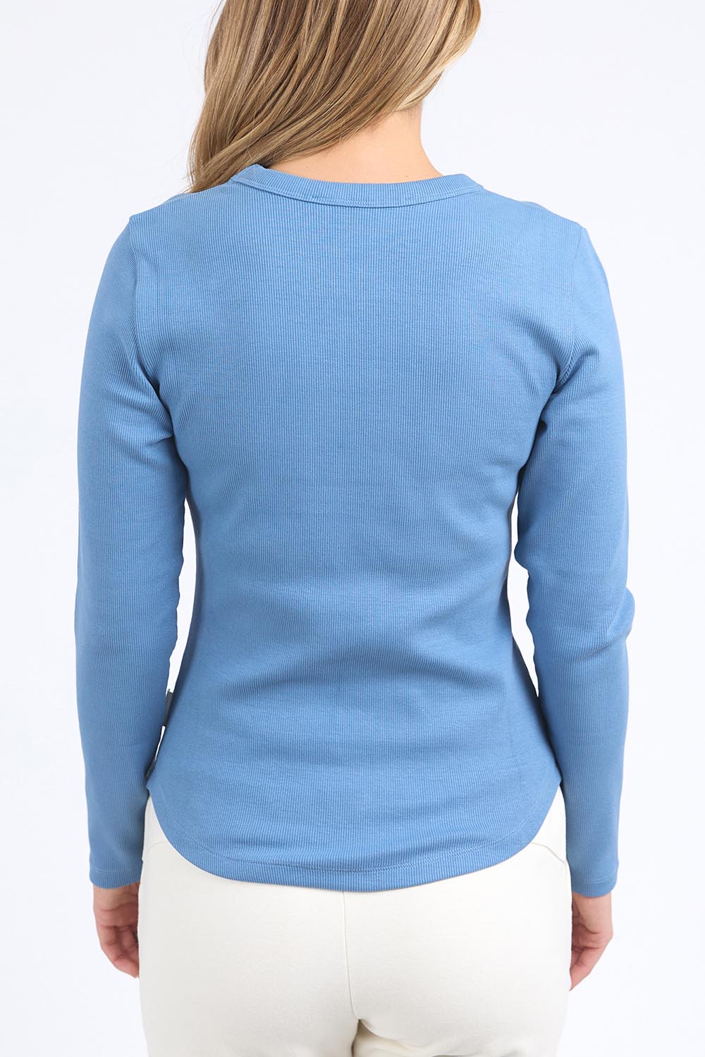 A model wearing the Elements Scoop Rib Cotton Blend  Long Sleeve in colour Coronetblu (Red), from the back