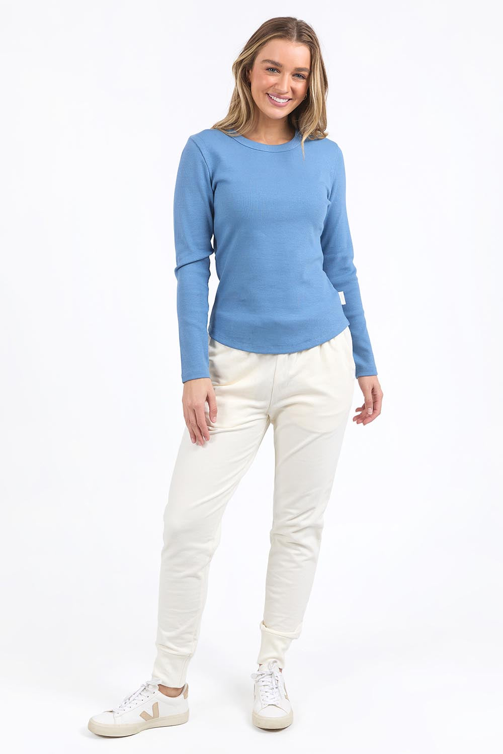 A model wearing the Elements Scoop Rib Cotton Blend  Long Sleeve in colour Coronetblu (Red), from the front, showing the whole outfit