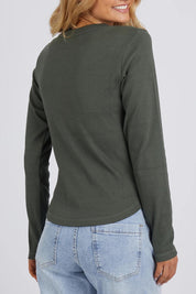 A model wearing the Elements Scoop Rib Cotton Blend  Long Sleeve in colour Khaki (Green), from the back