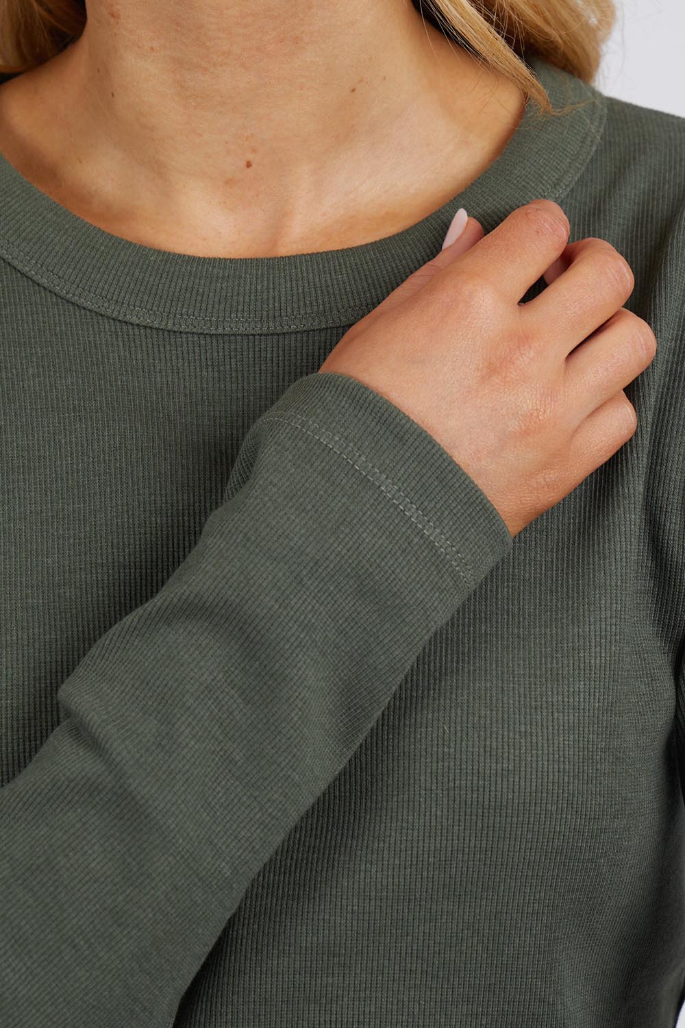 A model wearing the Elements Scoop Rib Cotton Blend  Long Sleeve in colour Khaki (Green), from the front, cropped image