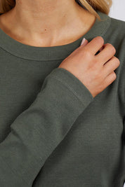 A model wearing the Elements Scoop Rib Cotton Blend  Long Sleeve in colour Khaki (Green), from the front, cropped image