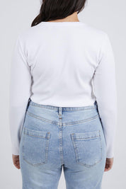 A model wearing the Elements Scoop Rib Cotton Blend  Long Sleeve in colour White (White), from the back