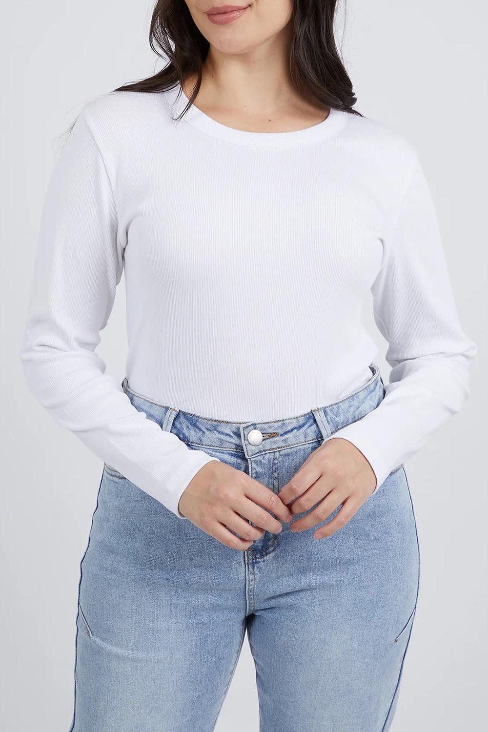 A model wearing the Elements Scoop Rib Cotton Blend  Long Sleeve in colour White (White), from the front, cropped image