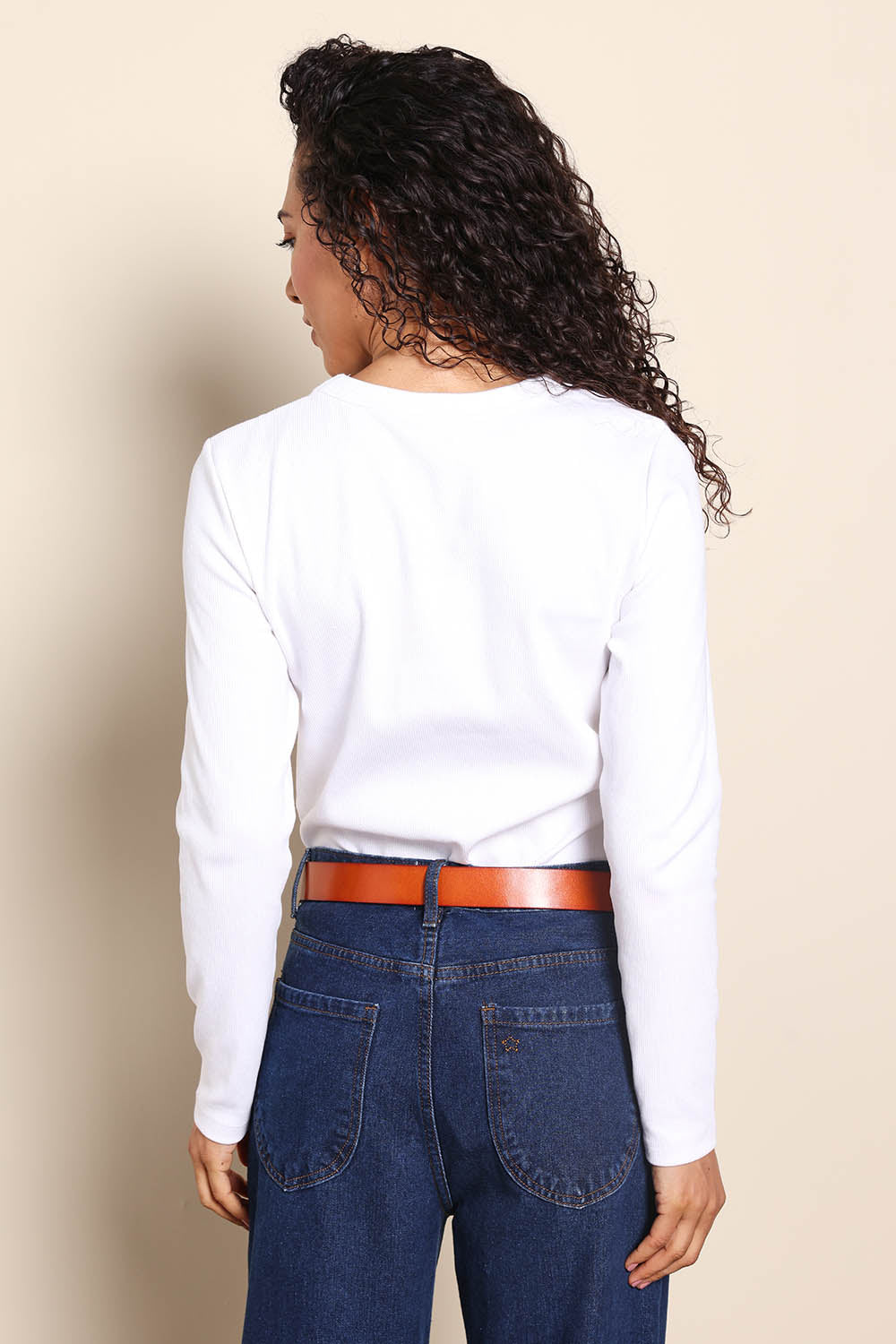 Model Pamelar wearing size 10 of the Elements Scoop Rib Cotton Blend  Long Sleeve - White in colour White, from the back