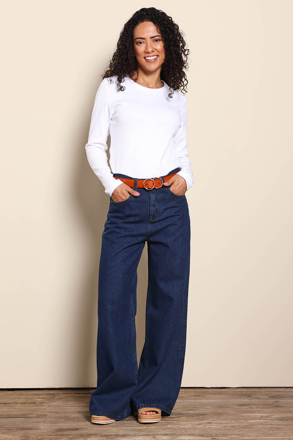 Model Pamelar wearing size 10 of the Elements Scoop Rib Cotton Blend  Long Sleeve - White in colour White, from the front