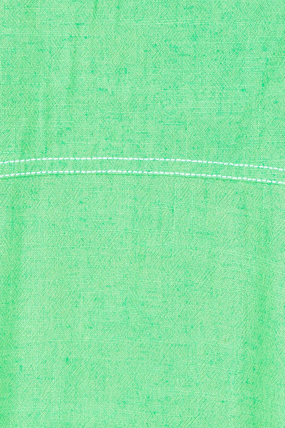 Product shot of the Sage Dress in colour Irishgreen (Green), detail