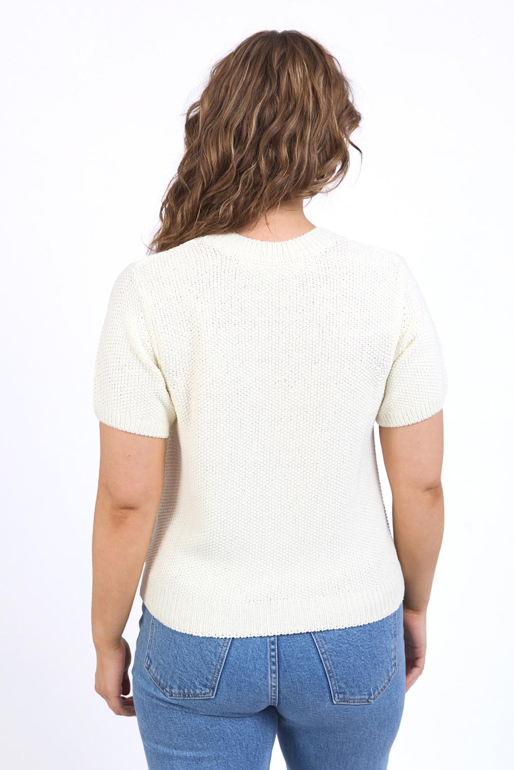 A model wearing the Blair Short Sleeve Cotton Knit in colour Vinwhite (White), from the back